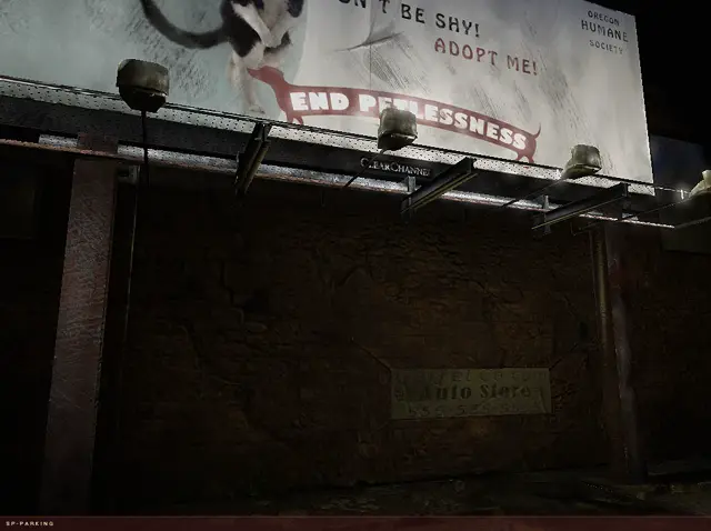 Billboard of a cat over a brick wall