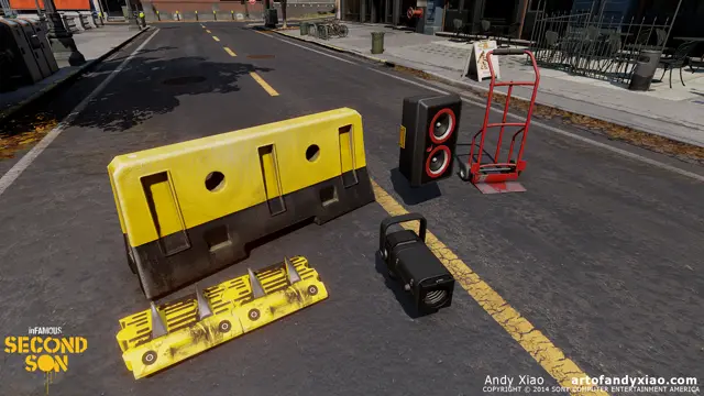 Barricades, a speaker and a hand truck